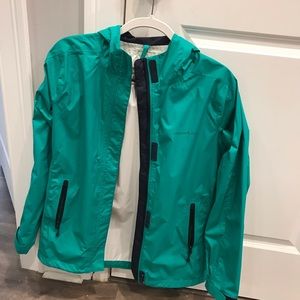 Green vineyard vines rain coat